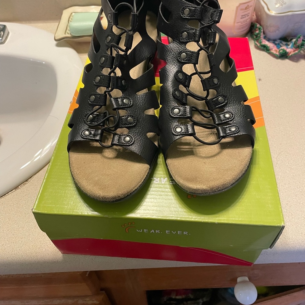 Sandals by Wear Ever.